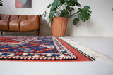 Vintage Turkish rug in a living room setting, pile rug, Turkish rug, vintage rug, portland, rug shop, bright colors, wild shaman, soft rug, bold color, Portland, Oregon, rug store, rug shop, local shop, antique rug