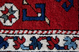 Vintage Turkish rug in a living room setting, pile rug, Turkish rug, vintage rug, portland, rug shop, bright colors, wild shaman, soft rug, bold color, Portland, Oregon, rug store, rug shop, local shop, antique rug
