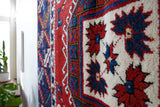 Vintage Turkish rug in a living room setting, pile rug, Turkish rug, vintage rug, portland, rug shop, bright colors, wild shaman, soft rug, bold color, Portland, Oregon, rug store, rug shop, local shop, antique rug