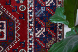 Vintage Turkish rug in a living room setting, pile rug, Turkish rug, vintage rug, portland, rug shop, bright colors, wild shaman, soft rug, bold color, Portland, Oregon, rug store, rug shop, local shop, antique rug