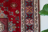 Vintage Turkish rug in a living room setting, pile rug, Turkish rug, vintage rug, portland, rug shop, bright colors, wild shaman, soft rug, bold color, Portland, Oregon, rug store, rug shop, local shop, antique rug