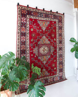 Vintage Turkish rug in a living room setting, pile rug, Turkish rug, vintage rug, portland, rug shop, bright colors, wild shaman, soft rug, bold color, Portland, Oregon, rug store, rug shop, local shop, antique rug