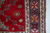 Vintage Turkish rug in a living room setting, pile rug, Turkish rug, vintage rug, portland, rug shop, bright colors, wild shaman, soft rug, bold color, Portland, Oregon, rug store, rug shop, local shop, antique rug
