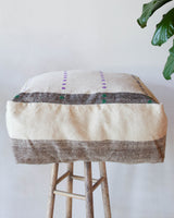 Floor pouf in a living room setting, pillow, turkish pillow, kilim pillow, home decor, decorative pillow, sham, rug pillow, decor, home decor, pouf, floor cushion, cushion, Portland, rugshop, Oregon, Wild Shaman, ottoman