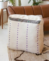 Floor pouf in a living room setting, pillow, turkish pillow, kilim pillow, home decor, decorative pillow, sham, rug pillow, decor, home decor, pouf, floor cushion, cushion, Portland, rugshop, Oregon, Wild Shaman, ottoman