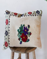 Floor pouf in a living room setting, pillow, turkish pillow, kilim pillow, home decor, decorative pillow, sham, rug pillow, decor, home decor, pouf, floor cushion, cushion, Portland, rugshop, Oregon, Wild Shaman, ottoman