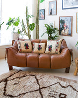 Floor pouf in a living room setting, pillow, turkish pillow, kilim pillow, home decor, decorative pillow, sham, rug pillow, decor, home decor, pouf, floor cushion, cushion, Portland, rugshop, Oregon, Wild Shaman, ottoman