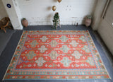 orange, green, bright color, antique, oushak rug, portland rug shop, rug store, wild shaman