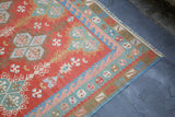 orange, green, bright color, antique, oushak rug, portland rug shop, rug store, wild shaman