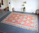 orange, green, bright color, antique, oushak rug, portland rug shop, rug store, wild shaman