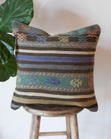 Floor pouf in a living room setting, pillow, turkish pillow, kilim pillow, home decor, decorative pillow, sham, rug pillow, decor, home decor, pouf, floor cushion, cushion, Portland, rugshop, Oregon, Wild Shaman, ottoman