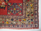 Vintage Turkish rug in a living room setting, pile rug, Turkish rug, vintage rug, portland, rug shop, bright colors, wild shaman, soft rug, bold color, Portland, Oregon, rug store, rug shop, local shop, antique rug,