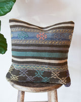 Floor pouf in a living room setting, pillow, turkish pillow, kilim pillow, home decor, decorative pillow, sham, rug pillow, decor, home decor, pouf, floor cushion, cushion, Portland, rugshop, Oregon, Wild Shaman, ottoman