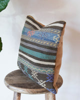 Floor pouf in a living room setting, pillow, turkish pillow, kilim pillow, home decor, decorative pillow, sham, rug pillow, decor, home decor, pouf, floor cushion, cushion, Portland, rugshop, Oregon, Wild Shaman, ottoman