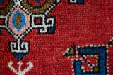 Vintage Turkish rug in a living room setting, pile rug, Turkish rug, vintage rug, portland, rug shop, bright colors, wild shaman, soft rug, bold color, Portland, Oregon, rug store, rug shop, local shop, antique rug,