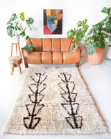 Vintage Turkish rug in living room setting, old rug, antique rug, pastel colors, faded colors, Turkish rug, vintage rug, soft rug, Portland, Oregon, rug store, rug shop, local shop, undyed rug, natural colors