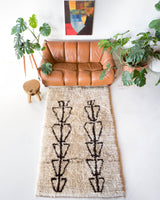 Vintage Turkish rug in living room setting, old rug, antique rug, pastel colors, faded colors, Turkish rug, vintage rug, soft rug, Portland, Oregon, rug store, rug shop, local shop, undyed rug, natural colors