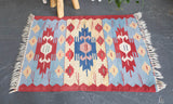 old rug, antique rug, earthy colors, faded colors, turkish rug, vintage rug, flat weave, mini rug, pile rug, Wild Shaman, Portland, Oregon, rug store, rug shop, local shop, kilim rug