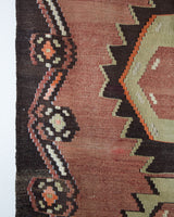 Vintage kilim rug in living room setting, old rug, antique rug, pastel colors, faded colors, Turkish rug, vintage rug, soft rug, Portland, Oregon, rug store, rug shop, local shop, earthy tones, earthy colors