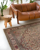 Vintage Turkish rug in living room setting, old rug, antique rug, pastel colors, faded colors, Turkish rug, vintage rug, soft rug, Portland, Oregon, rug store, rug shop, local shop