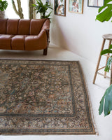 Vintage Turkish rug in living room setting, old rug, antique rug, pastel colors, faded colors, Turkish rug, vintage rug, soft rug, Portland, Oregon, rug store, rug shop, local shop