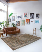 Vintage Turkish rug in living room setting, old rug, antique rug, pastel colors, faded colors, Turkish rug, vintage rug, soft rug, Portland, Oregon, rug store, rug shop, local shop