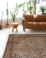 Vintage Turkish rug in living room setting, old rug, antique rug, pastel colors, faded colors, Turkish rug, vintage rug, soft rug, Portland, Oregon, rug store, rug shop, local shop