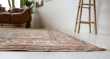 Vintage Turkish rug in living room setting, old rug, antique rug, pastel colors, faded colors, Turkish rug, vintage rug, soft rug, Portland, Oregon, rug store, rug shop, local shop