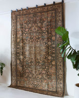 Vintage Turkish rug in living room setting, old rug, antique rug, pastel colors, faded colors, Turkish rug, vintage rug, soft rug, Portland, Oregon, rug store, rug shop, local shop