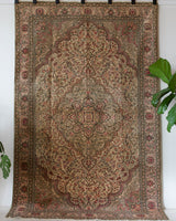 Vintage Turkish rug in living room setting, old rug, antique rug, pastel colors, faded colors, Turkish rug, vintage rug, soft rug, Portland, Oregon, rug store, rug shop, local shop