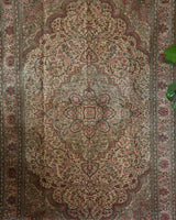 Vintage Turkish rug in living room setting, old rug, antique rug, pastel colors, faded colors, Turkish rug, vintage rug, soft rug, Portland, Oregon, rug store, rug shop, local shop