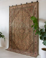 Vintage Turkish rug in living room setting, old rug, antique rug, pastel colors, faded colors, Turkish rug, vintage rug, soft rug, Portland, Oregon, rug store, rug shop, local shop