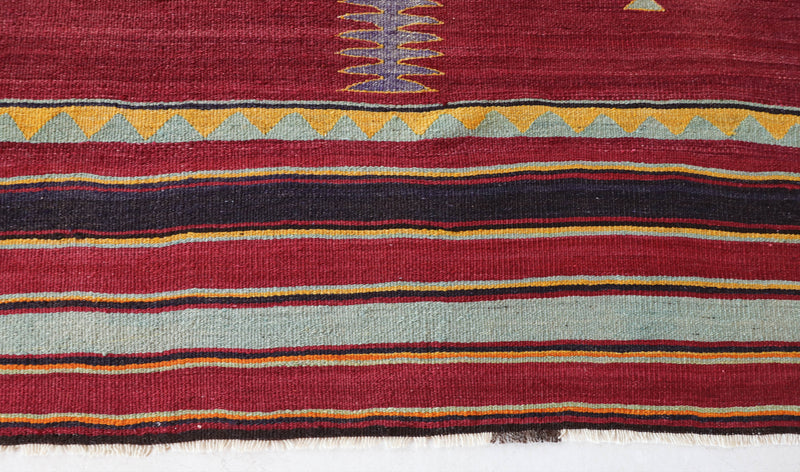 Vintage kilim rug in living room setting, bright colors, wild shaman, soft rug, bold color, Portland, Oregon, rug store, rug shop, local shop, vintage rug, modern kilim, warm colors, antique kilim rug