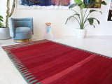 Vintage kilim rug in living room setting, bright colors, wild shaman, soft rug, bold color, Portland, Oregon, rug store, rug shop, local shop, vintage rug, modern kilim, warm colors, antique kilim rug