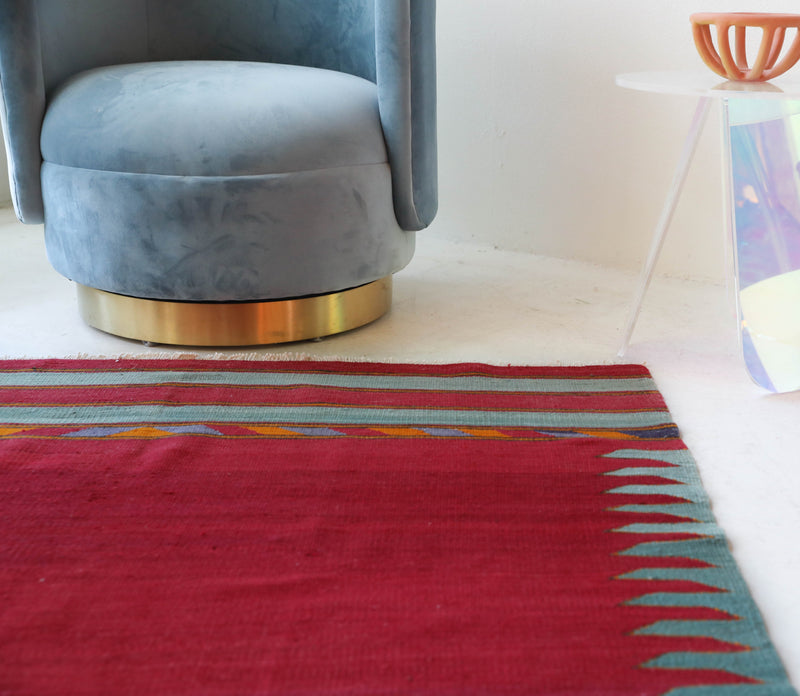 Vintage kilim rug in living room setting, bright colors, wild shaman, soft rug, bold color, Portland, Oregon, rug store, rug shop, local shop, vintage rug, modern kilim, warm colors, antique kilim rug