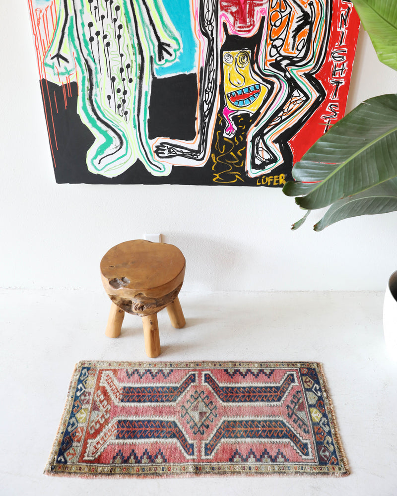  Vintage Turkish mini rug in room decor setting, old rug, antique rug, pastel colors, faded colors, Turkish rug, vintage rug, soft rug, Portland, Oregon, rug store, rug shop, local shop,  bright colors, bold colors