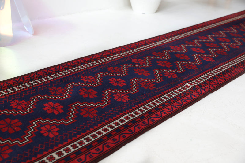 Vintage Turkish runner rug in a living room setting, pile rug, Turkish rug, vintage rug, portland, rug shop, bright colors, wild shaman, soft rug, bold color, Portland, Oregon, rug store, rug shop, local shop, antique rug