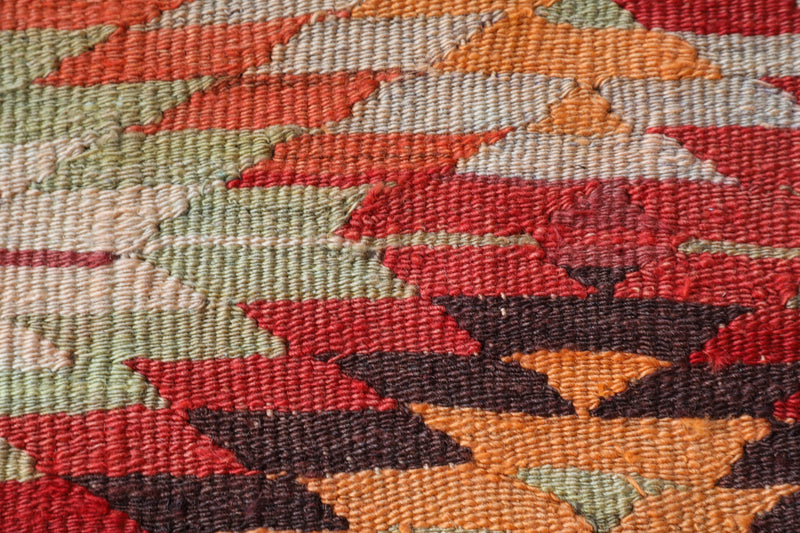  Vintage kilim rug in room decor setting, old rug, antique rug, pastel colors, faded colors, Turkish rug, vintage rug, soft rug, Portland, Oregon, rug store, rug shop, local shop,  antique kilim rug, bold colors, bright colors, faded colors