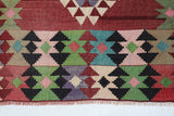  Vintage kilim rug in living room setting, old rug, antique rug, pastel colors, faded colors, Turkish rug, vintage rug, soft rug, Portland, Oregon, rug store, rug shop, local shop, earthy tones, earthy colors, warm colors