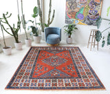 Vintage Turkish rug in a living room setting, Area rug in a living room setting, pile rug, Turkish rug, custom rug, modern rug, portland, rug shop, bright colors, wild shaman, soft rug, bold color, Portland, Oregon, rug store, rug shop, local shop