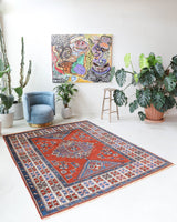 Vintage Turkish rug in a living room setting, Area rug in a living room setting, pile rug, Turkish rug, custom rug, modern rug, portland, rug shop, bright colors, wild shaman, soft rug, bold color, Portland, Oregon, rug store, rug shop, local shop