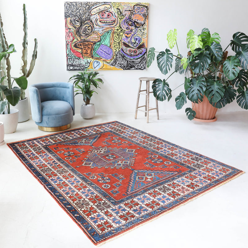 Vintage Turkish rug in a living room setting, Area rug in a living room setting, pile rug, Turkish rug, custom rug, modern rug, portland, rug shop, bright colors, wild shaman, soft rug, bold color, Portland, Oregon, rug store, rug shop, local shop