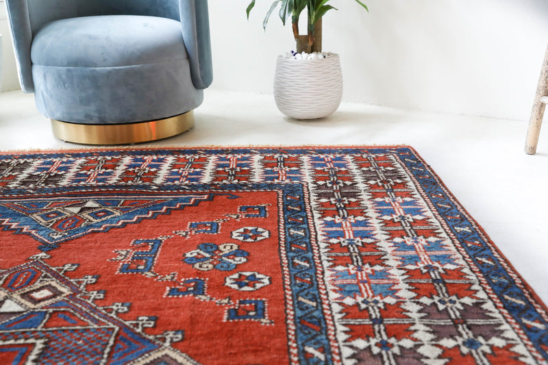 Vintage Turkish rug in a living room setting, Area rug in a living room setting, pile rug, Turkish rug, custom rug, modern rug, portland, rug shop, bright colors, wild shaman, soft rug, bold color, Portland, Oregon, rug store, rug shop, local shop