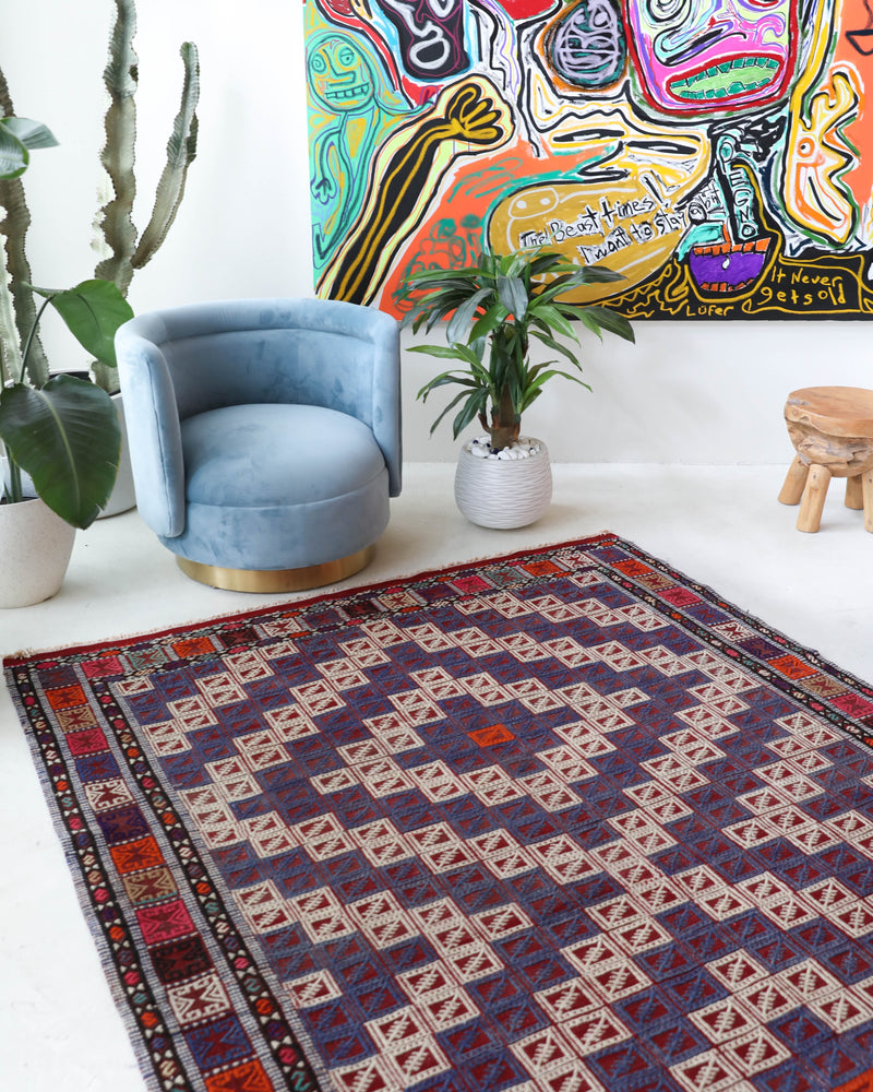 Vintage kilim rug in living room setting, bright colors, wild shaman, soft rug, bold color, Portland, Oregon, rug store, rug shop, local shop, vintage rug, modern kilim, warm colors, antique kilim rug