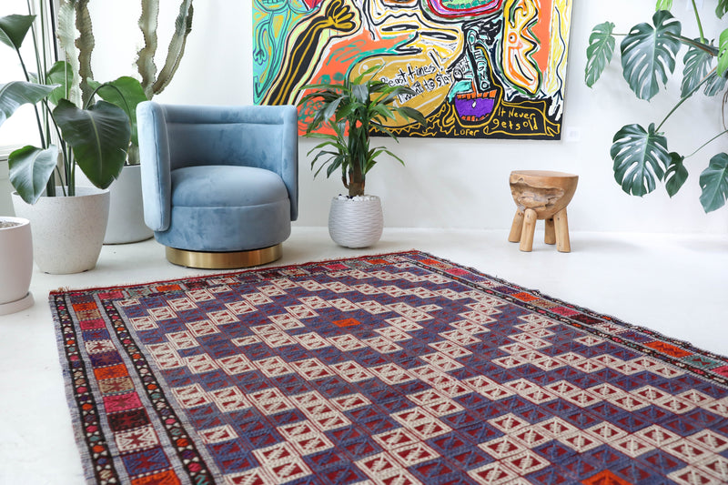 Vintage kilim rug in living room setting, bright colors, wild shaman, soft rug, bold color, Portland, Oregon, rug store, rug shop, local shop, vintage rug, modern kilim, warm colors, antique kilim rug