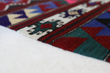Vintage kilim rug in room decor setting, old rug, antique rug, pastel colors, faded colors, Turkish rug, vintage rug, soft rug, Portland, Oregon, rug store, rug shop, local shop,  antique kilim rug, bold colors, bright colors, faded colors