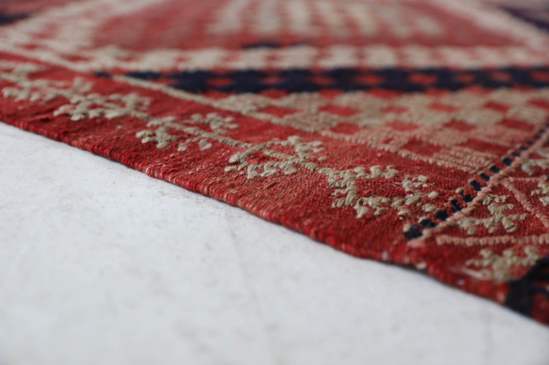 Vintage kilim rug in living room setting, old rug, antique rug, pastel colors, faded colors, Turkish rug, vintage rug, soft rug, Portland, Oregon, rug store, rug shop, local shop, earthy tones, earthy colors, warm colors