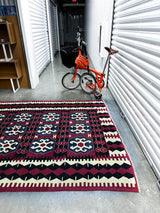 Vintage kilim rug in living room setting, bright colors, wild shaman, soft rug, bold color, Portland, Oregon, rug store, rug shop, local shop, vintage rug, modern kilim, warm colors, antique rug, antique kilim