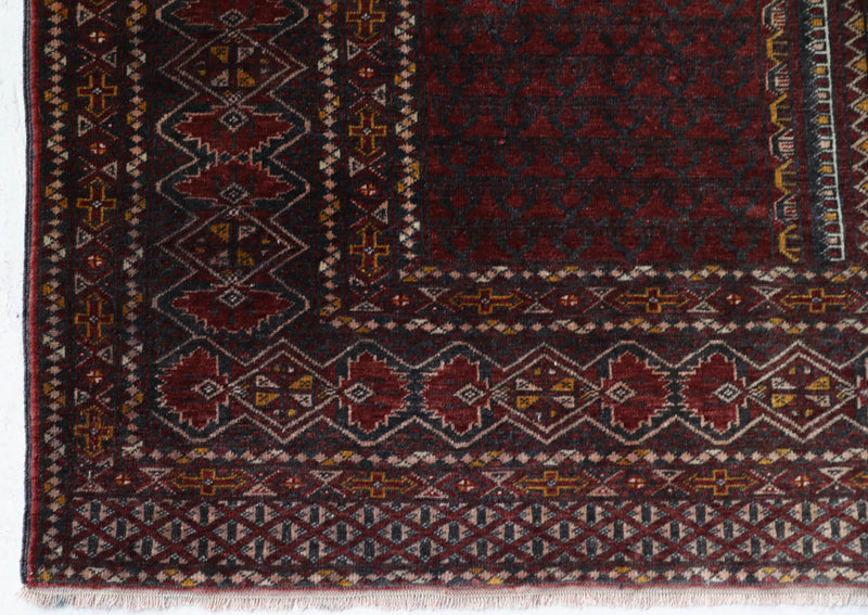 Turkmen rug in a living room setting, pile rug, Turkish rug, vintage rug, portland, rug shop, bright colors, wild shaman, soft rug, bold color, Portland, Oregon, rug store, rug shop, local shop, antique rug