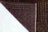 Turkmen rug in a living room setting, pile rug, Turkish rug, vintage rug, portland, rug shop, bright colors, wild shaman, soft rug, bold color, Portland, Oregon, rug store, rug shop, local shop, antique rug